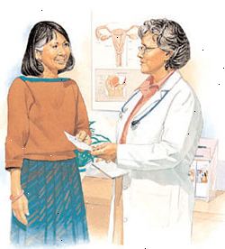 Proveedor de atención médica que da la prescripción a la mujer. Proveedor de atención médica que da la prescripción a la mujer.